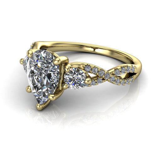 Ryleigh pear three stone engagement ring in 14K Yellow Gold, three-quarter perspective showing the pear center between two round side stones above a twisted pav&eacute; band