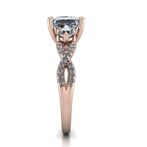 Ryleigh princess three stone engagement ring in 18K Rose Gold, side profile showing the twisted pav&eacute; infinity band sweeping to the princess center