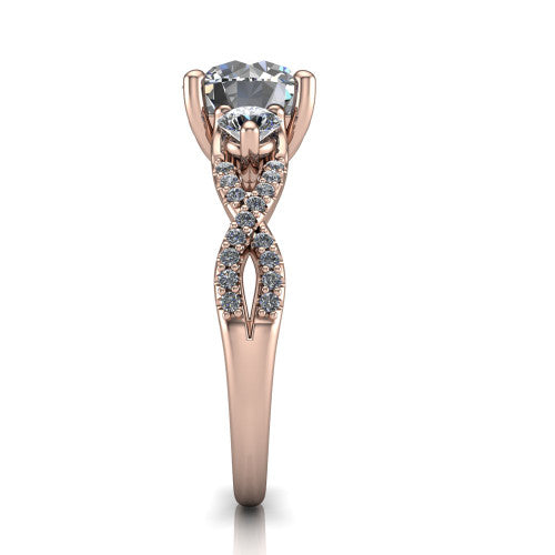 Ryleigh round three stone engagement ring in 14K Rose Gold, side profile showing the twisted pav&eacute; infinity band sweeping to the round center