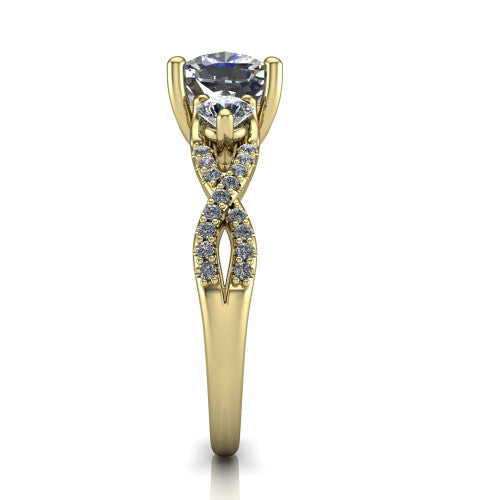 Ryleigh cushion three stone engagement ring in 14K Yellow Gold, side profile showing the twisted pav&eacute; infinity band sweeping to the cushion center