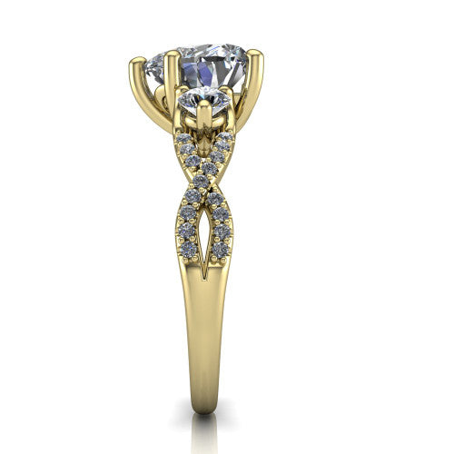 Ryleigh heart three stone engagement ring in 14K Yellow Gold, side profile showing the twisted pav&eacute; infinity band sweeping to the heart center