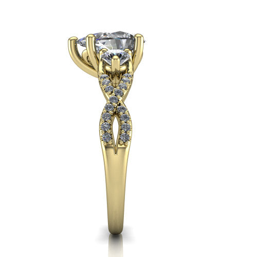 Ryleigh pear three stone engagement ring in 14K Yellow Gold, side profile showing the twisted pav&eacute; infinity band sweeping to the pear center