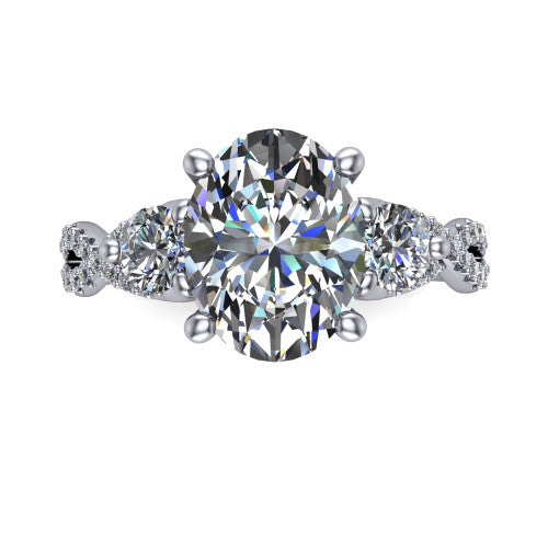 Ryleigh oval three stone engagement ring in 14K White Gold, top-down view showing the oval center flanked by two round accent diamonds and the pav&eacute; twist