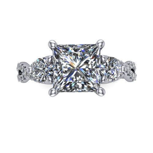Ryleigh princess three stone engagement ring in Platinum, top-down view showing the princess center flanked by two round accent diamonds and the pav&eacute; twist