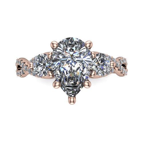 Ryleigh pear three stone engagement ring in 14K Rose Gold, top-down view showing the pear center flanked by two round accent diamonds and the pav&eacute; twist