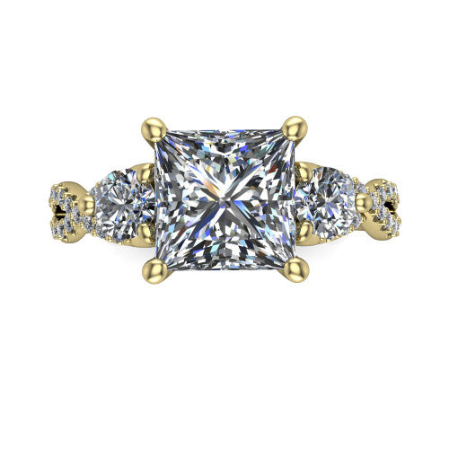 Ryleigh princess three stone engagement ring in 14K Yellow Gold, top-down view showing the princess center flanked by two round accent diamonds and the pav&eacute; twist