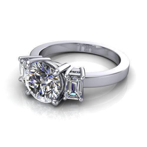 Madelyn round three stone engagement ring in Platinum with emerald-cut side stones, three-quarter perspective view