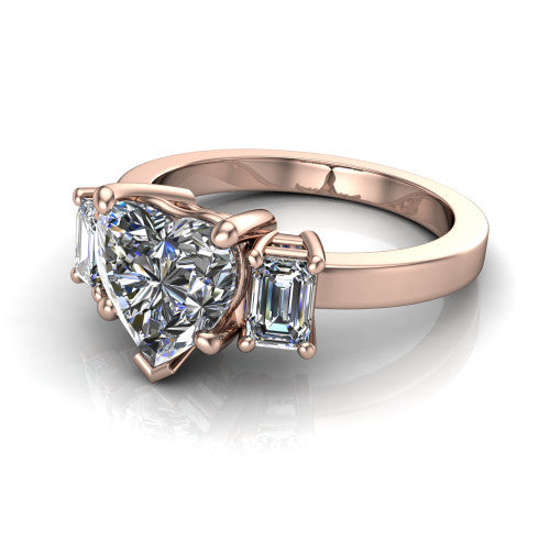 Madelyn heart three stone engagement ring in 14K Rose Gold with emerald-cut side stones, three-quarter perspective view