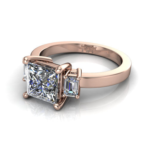 Madelyn princess three stone engagement ring in 14K Rose Gold with emerald-cut side stones, three-quarter perspective view
