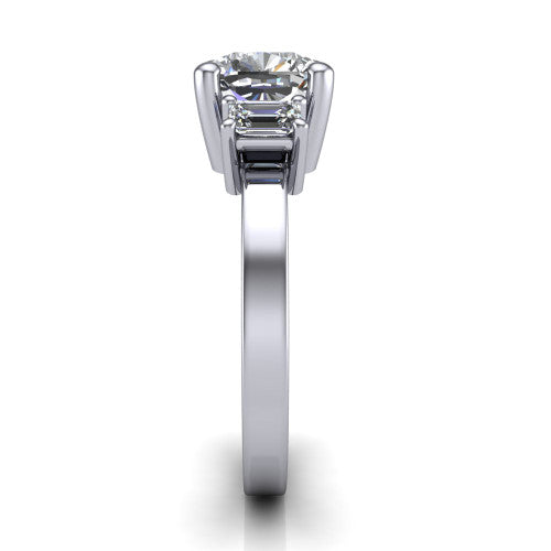Madelyn cushion three stone engagement ring in 14K White Gold with emerald-cut side stones, side profile showing the plain band and step-cut side stones