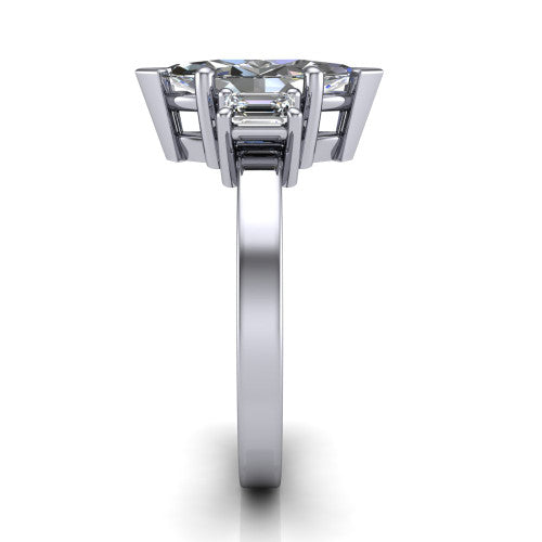 Madelyn marquise three stone engagement ring in Platinum with emerald-cut side stones, side profile showing the plain band and step-cut side stones