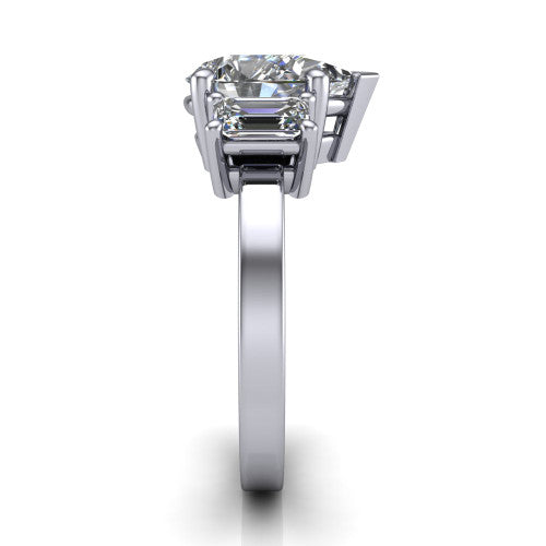 Madelyn pear three stone engagement ring in 14K White Gold with emerald-cut side stones, side profile showing the plain band and step-cut side stones