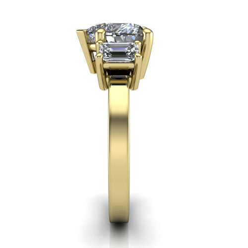 Madelyn heart three stone engagement ring in 14K Yellow Gold with emerald-cut side stones, side profile showing the plain band and step-cut side stones