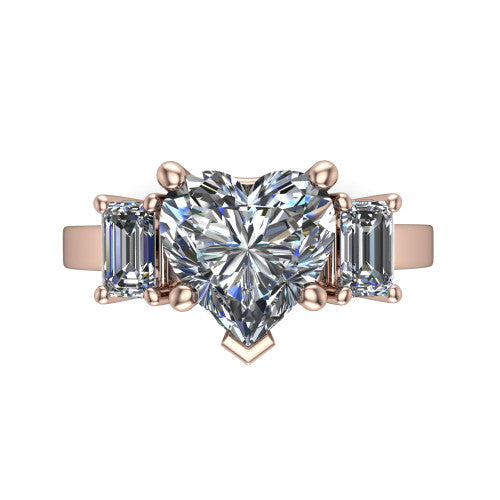 Madelyn heart three stone engagement ring in 18K Rose Gold with emerald-cut side stones, top-down view of the center and emerald-cut side stones