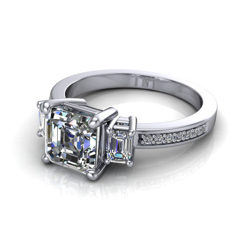 Freya square emerald three stone engagement ring in 14K White Gold, three-quarter perspective showing the square emerald center between two emerald cut side stones above a pav&eacute; band