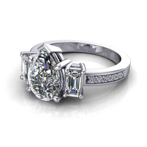Freya pear three stone engagement ring in 18K White Gold, three-quarter perspective showing the pear center between two emerald cut side stones above a pav&eacute; band