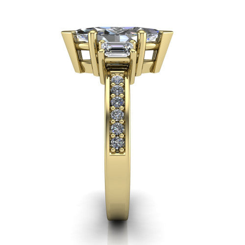 Freya marquise three stone engagement ring in 18K Yellow Gold, side profile showing the pav&eacute; milgrain band and the three-stone setting in profile