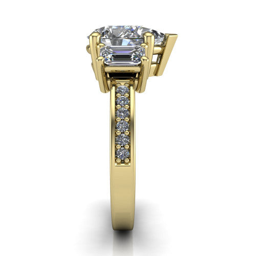 Freya pear three stone engagement ring in 18K Yellow Gold, side profile showing the pav&eacute; milgrain band and the three-stone setting in profile