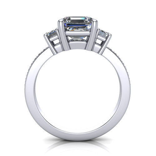 Freya square emerald three stone engagement ring in 18K White Gold, through-finger front profile showing the three-stone head above the open under-gallery and pav&eacute; band
