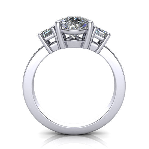 Freya pear three stone engagement ring in Platinum, through-finger front profile showing the three-stone head above the open under-gallery and pav&eacute; band