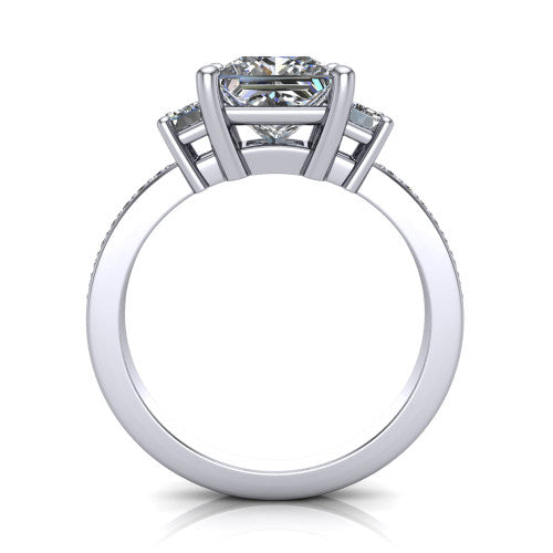 Freya princess three stone engagement ring in Platinum, through-finger front profile showing the three-stone head above the open under-gallery and pav&eacute; band