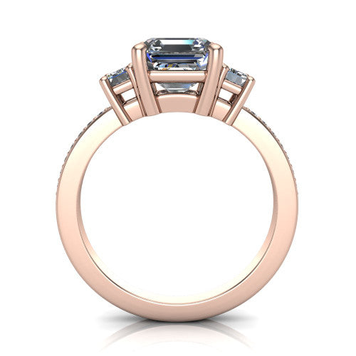 Freya square emerald three stone engagement ring in 18K Rose Gold, through-finger front profile showing the three-stone head above the open under-gallery and pav&eacute; band