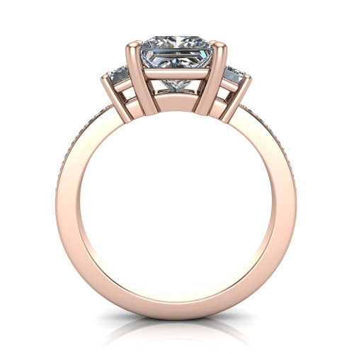 Freya princess three stone engagement ring in 18K Rose Gold, through-finger front profile showing the three-stone head above the open under-gallery and pav&eacute; band
