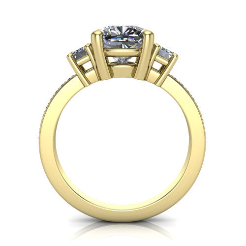 Freya cushion three stone engagement ring in 18K Yellow Gold, through-finger front profile showing the three-stone head above the open under-gallery and pav&eacute; band