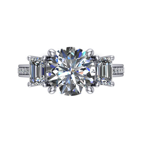Freya round three stone engagement ring in Platinum, top-down view showing the round center flanked by two emerald cut step-cut side diamonds