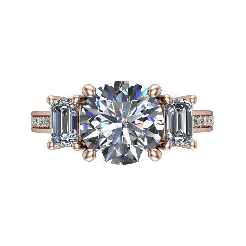 Freya round three stone engagement ring in 14K Rose Gold, top-down view showing the round center flanked by two emerald cut step-cut side diamonds