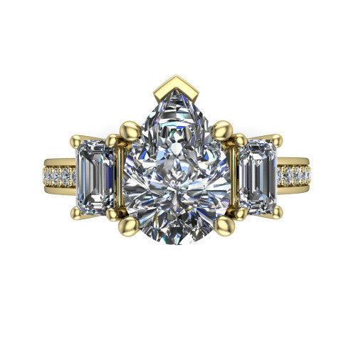 Freya pear three stone engagement ring in 18K Yellow Gold, top-down view showing the pear center flanked by two emerald cut step-cut side diamonds