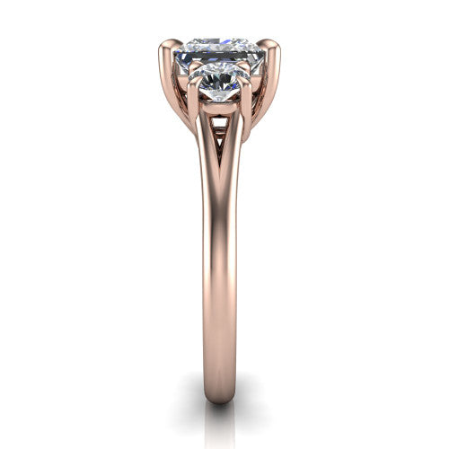 Jasmine princess three stone engagement ring in 18K Rose Gold with round side stones, side profile showing the plain band and split under-gallery