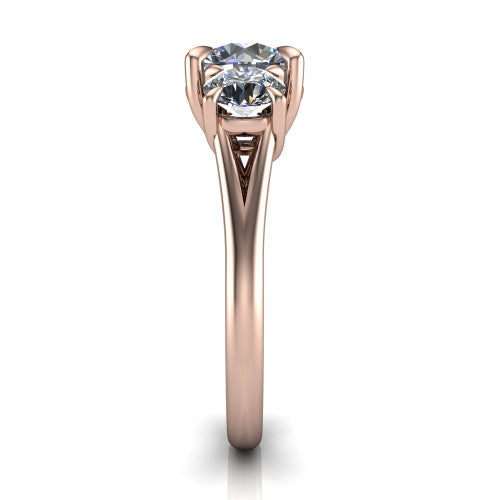Jasmine round three stone engagement ring in 14K Rose Gold with round side stones, side profile showing the plain band and split under-gallery