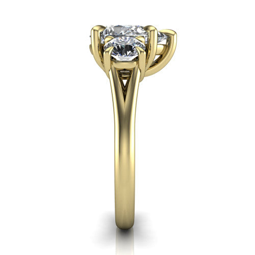 Jasmine pear three stone engagement ring in 14K Yellow Gold with round side stones, side profile showing the plain band and split under-gallery