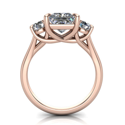 Jasmine princess three stone engagement ring in 18K Rose Gold with round side stones, through-finger front profile