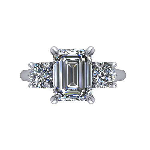 Jasmine emerald three stone engagement ring in 18K White Gold with round side stones, top-down view of the center and round side stones