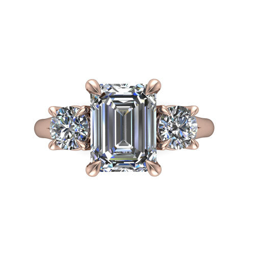 Jasmine emerald three stone engagement ring in 14K Rose Gold with round side stones, top-down view of the center and round side stones