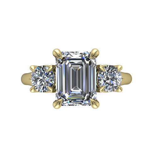 Jasmine emerald three stone engagement ring in 18K Yellow Gold with round side stones, top-down view of the center and round side stones