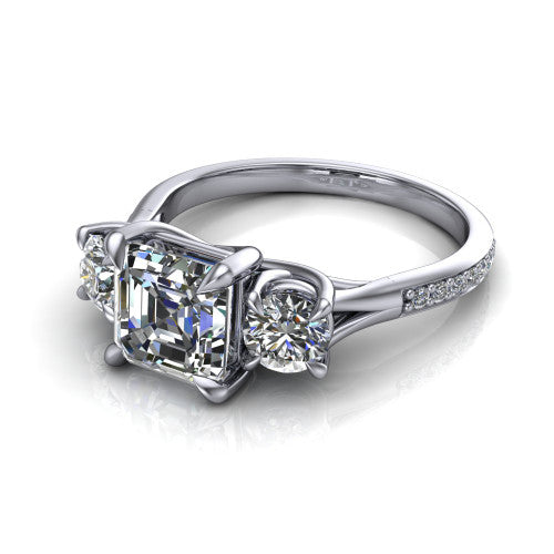 Ruth square emerald three stone engagement ring in 14K White Gold, three-quarter perspective showing the square emerald center between two round side stones above a pav&eacute; band