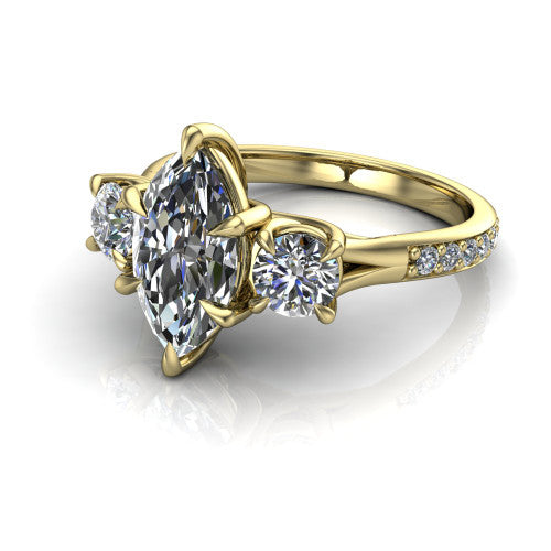 Ruth marquise three stone engagement ring in 18K Yellow Gold, three-quarter perspective showing the marquise center between two round side stones above a pav&eacute; band