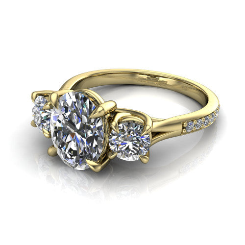 Ruth oval three stone engagement ring in 18K Yellow Gold, three-quarter perspective showing the oval center between two round side stones above a pav&eacute; band