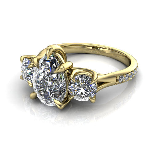 Ruth pear three stone engagement ring in 18K Yellow Gold, three-quarter perspective showing the pear center between two round side stones above a pav&eacute; band
