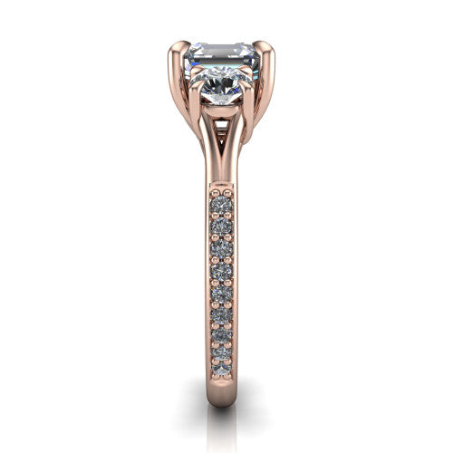 Ruth square emerald three stone engagement ring in 14K Rose Gold, side profile showing the pav&eacute; band and the three-stone setting in profile