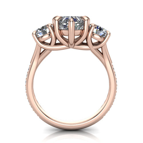 Ruth heart three stone engagement ring in 14K Rose Gold, through-finger front profile showing the three-stone head and scrolled gallery above the pav&eacute; band