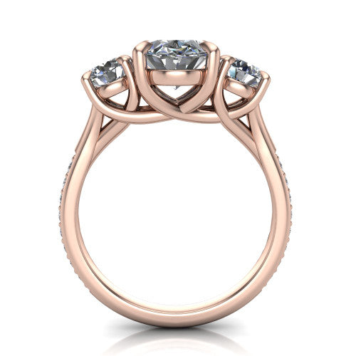 Ruth oval three stone engagement ring in 14K Rose Gold, through-finger front profile showing the three-stone head and scrolled gallery above the pav&eacute; band