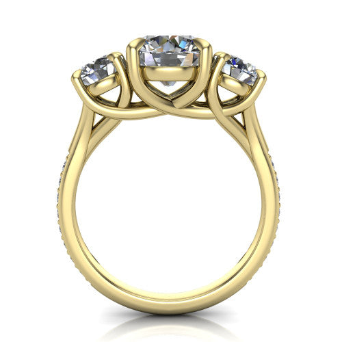 Ruth round three stone engagement ring in 18K Yellow Gold, through-finger front profile showing the three-stone head and scrolled gallery above the pav&eacute; band