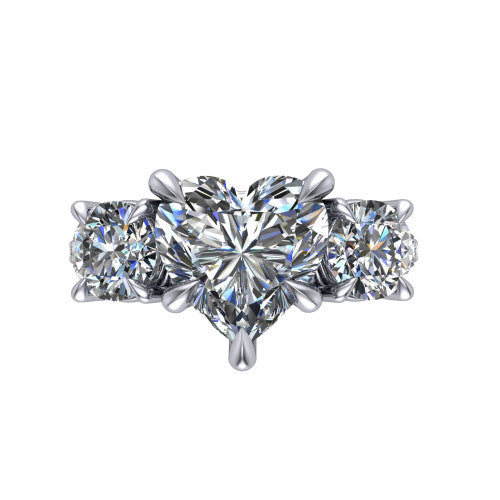 Ruth heart three stone engagement ring in 18K White Gold, top-down view showing the heart center flanked by two round accent diamonds
