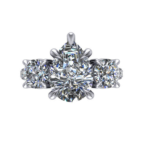 Ruth pear three stone engagement ring in 14K White Gold, top-down view showing the pear center flanked by two round accent diamonds
