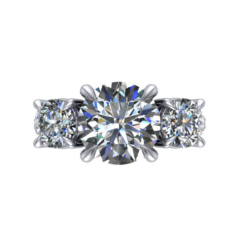 Ruth round three stone engagement ring in 14K White Gold, top-down view showing the round center flanked by two round accent diamonds