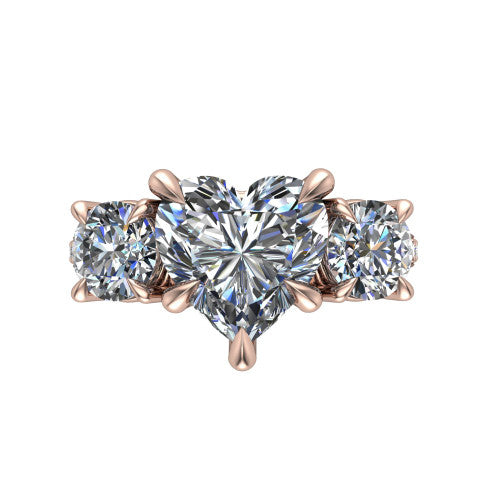 Ruth heart three stone engagement ring in 14K Rose Gold, top-down view showing the heart center flanked by two round accent diamonds